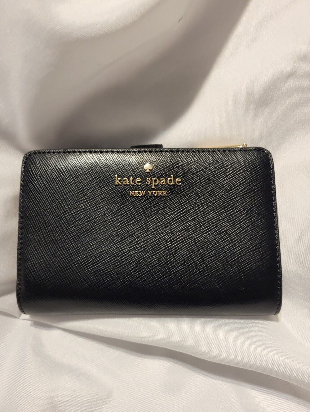 kate spade black pvc compact zip-around wallet with gold logo Ret $59